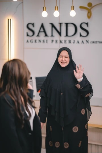 AP Sands staff greeting a client